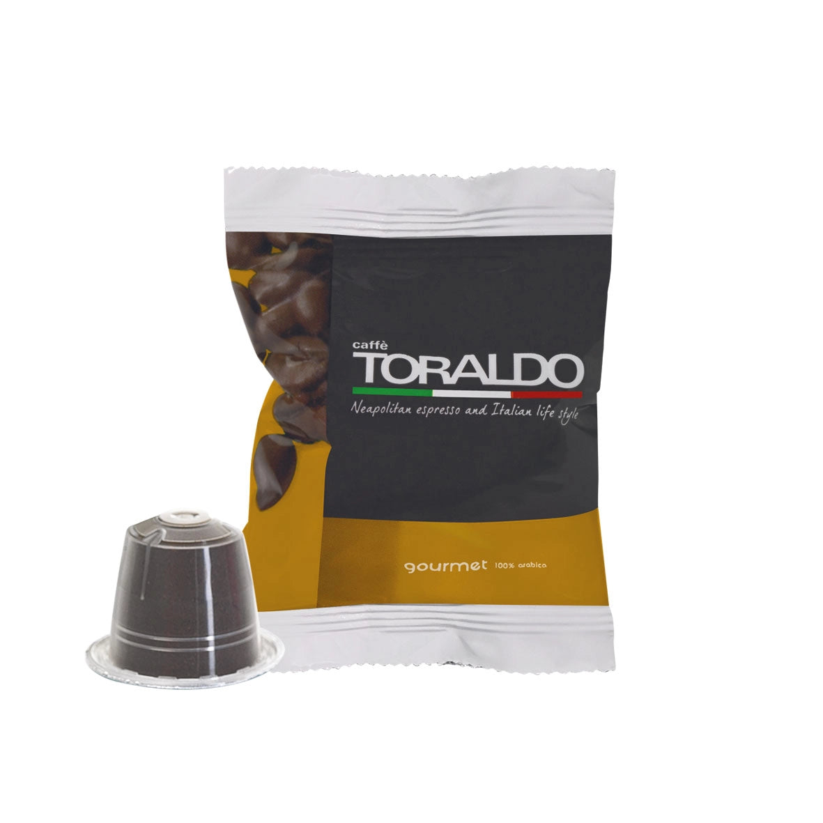 Toraldo Caffè Einzelpackung fũr Gourmet Kaffeekapsel, daneben die braune Kaffeekapsel vor weissem Hintergrund