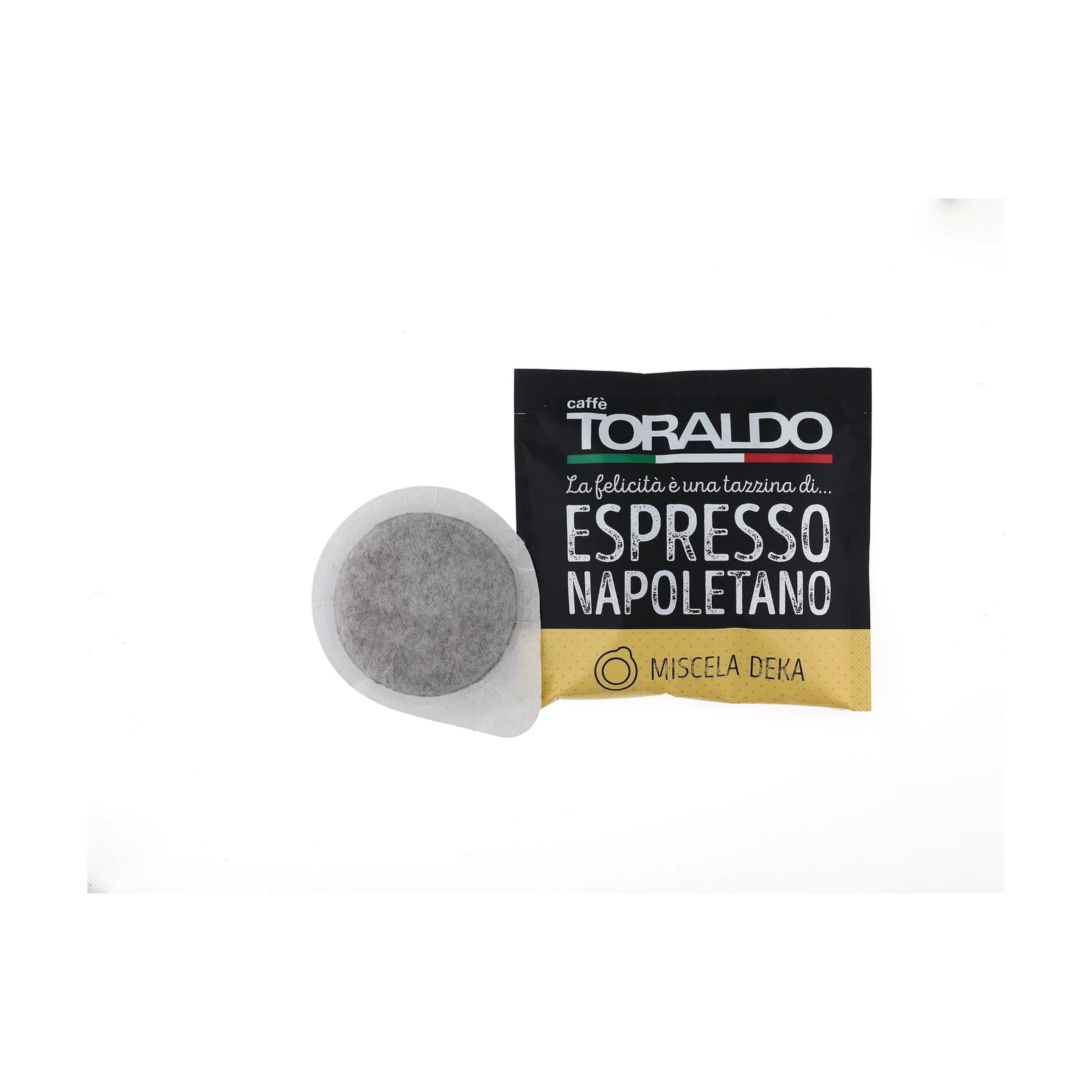Toraldo Caffè Einzelverpackung fũr Kaffee Pads Miscela DEKA, daneben das offene Kaffeepad vor weissem Hintergrund