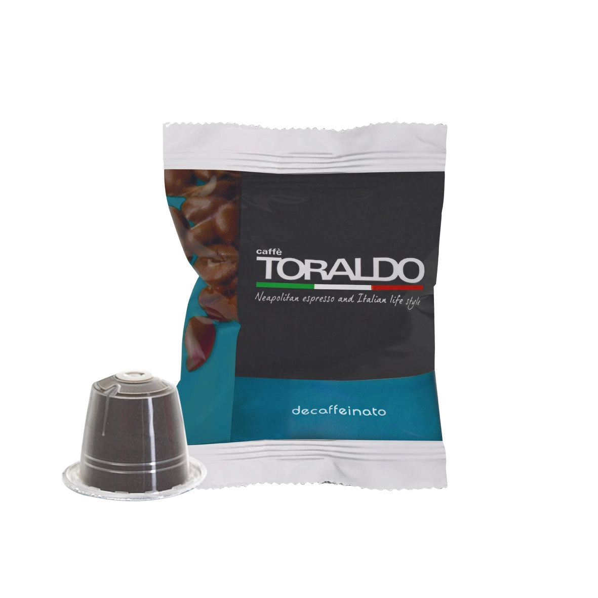 Toraldo Caffè Einzelpackung fũr Decaffeinato Kaffeekapsel, daneben die braune Kaffeekapsel vor weissem Hintergrund