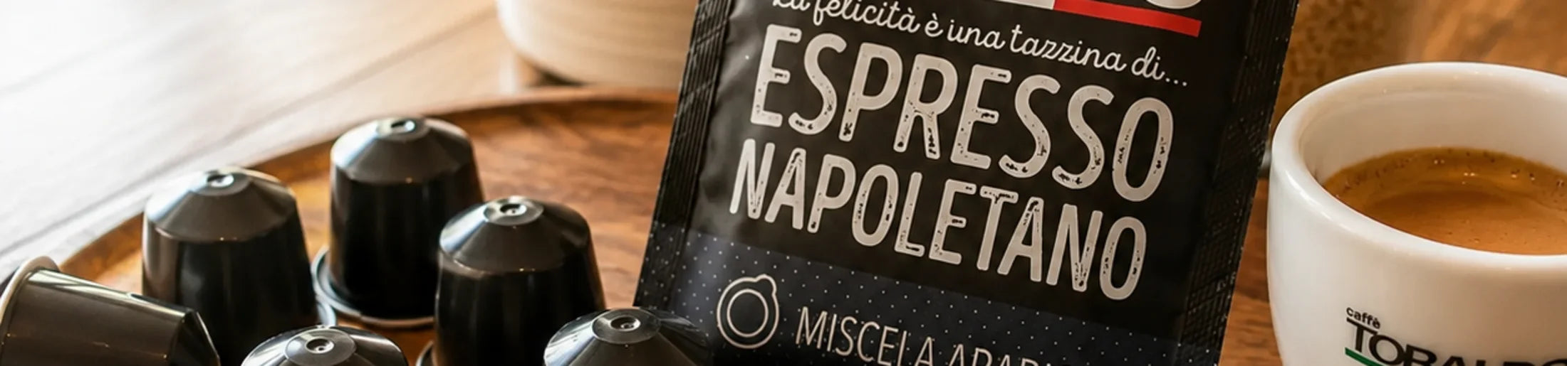 Toraldo Kaffeekapseln abgeschnitten mit der Verpackung